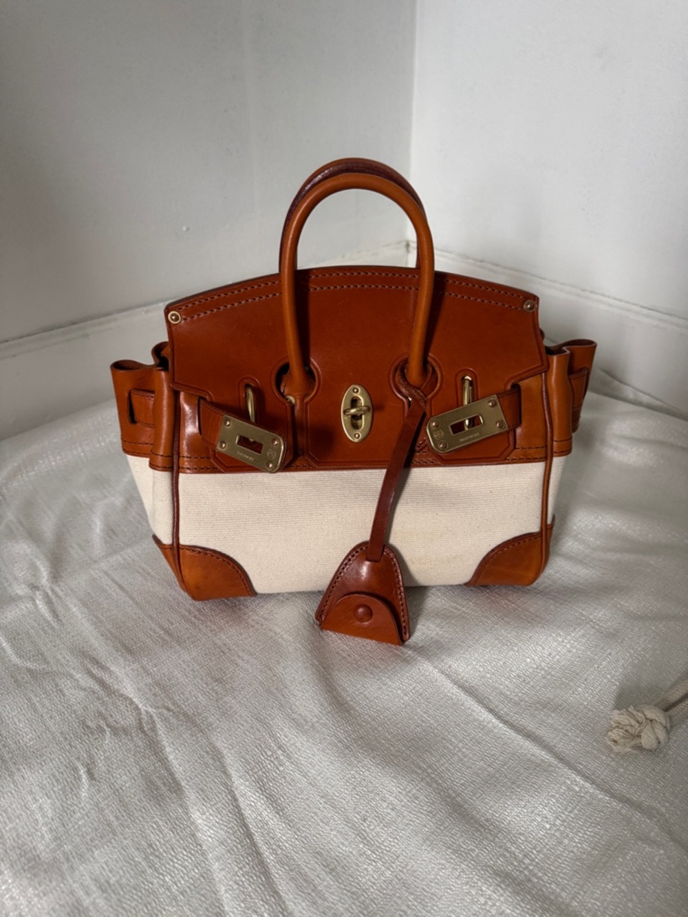 Vintage-inspired Atorie mini bag in rich caramel leather